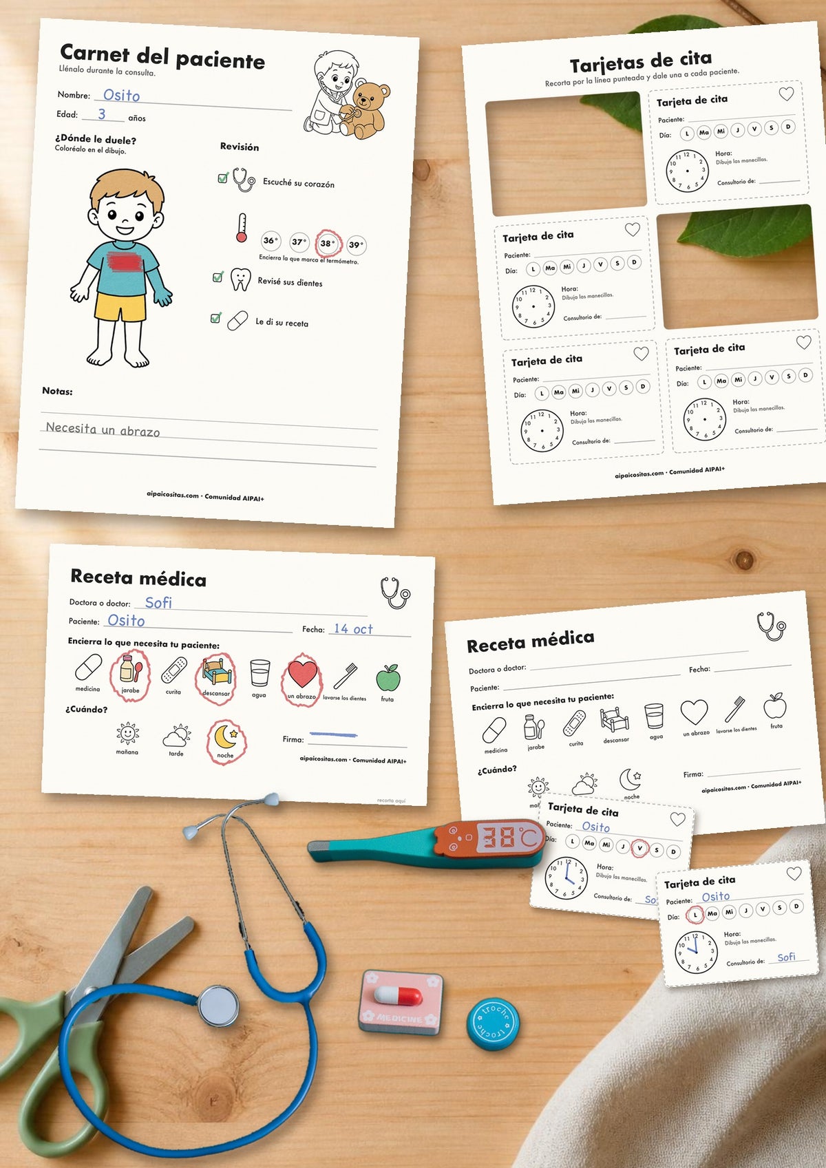 Kit para jugar al doctor de AIPAI usado sobre la mesa: receta, carnet y tarjetas de cita llenas, con el estetoscopio y el termómetro del set