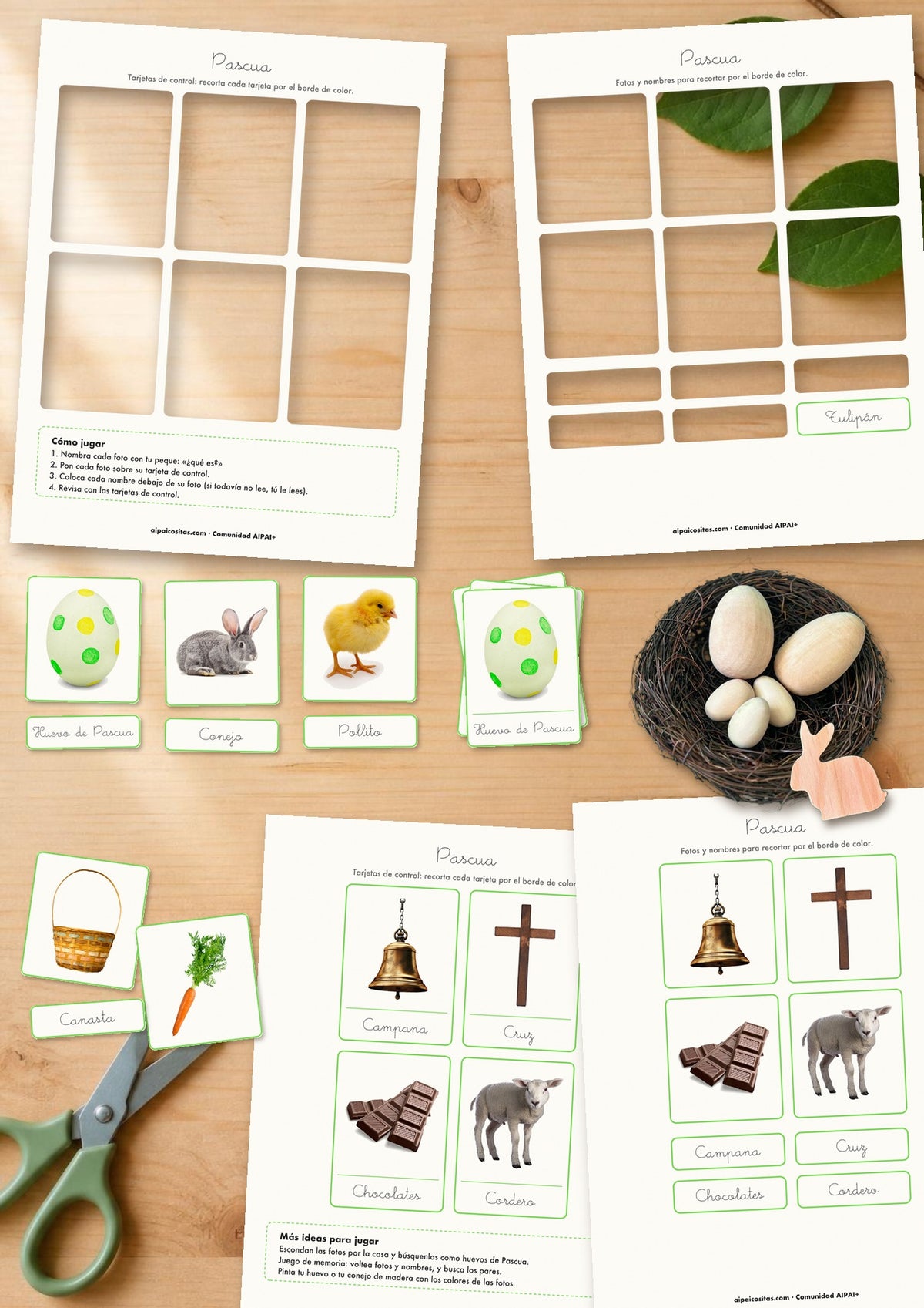Tarjetas de Pascua de AIPAI recortadas sobre la mesa, junto a un nido con huevos de madera y un conejo de madera